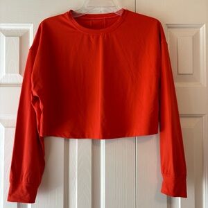 Lululemon Muscle Love Orange Long Sleeve Crop Top